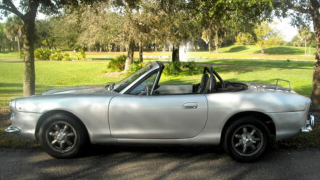 Illustration for article titled Mazda Miata dressed up like vintage Alfa answers a question no one asked